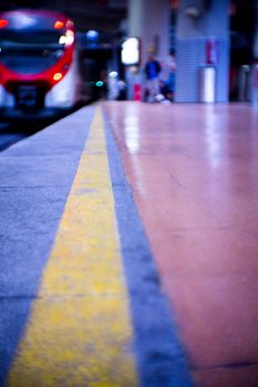 Empty train station with unfocused train, lonely environment