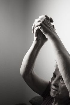 Rehabilitation exercises for an older woman with cerebral stroke
