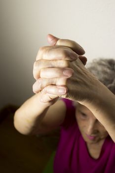 Rehabilitation exercises for an older woman with cerebral stroke