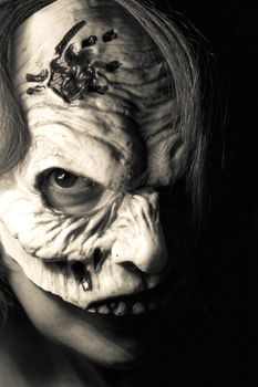 Portrait of a zombie woman at halloween party