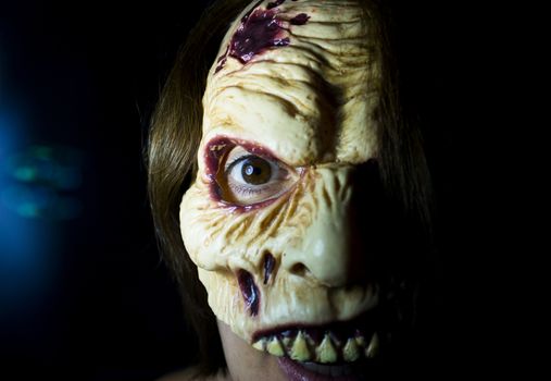Portrait of a zombie woman at halloween party