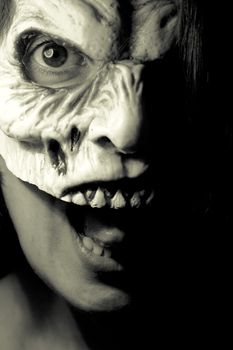 Portrait of a zombie woman at halloween party