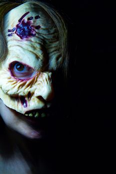 Portrait of a zombie woman at halloween party