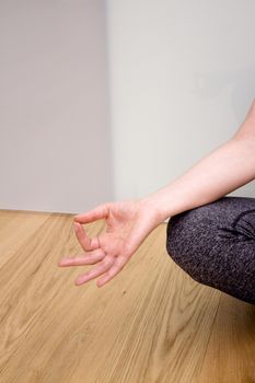 Womans hands practicing yoga and meditation positions.Mudras.