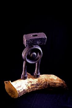Modern sculpture made with recycled materials.  Similar to human emotions and gestures.