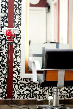 Part of a beauty salon with chairs for clients