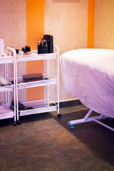 Cosmetic cabinet with stretcher and accessories for face and makeup cleaning