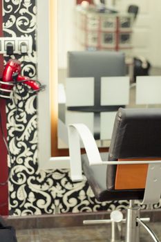 Part of a beauty salon with chairs for clients