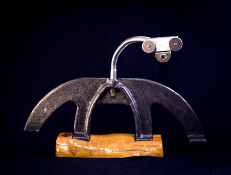 Modern sculpture made with recycled materials.  Similar to human emotions and gestures.