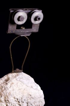 Modern sculpture made with recycled materials.  Similar to human emotions and gestures.
