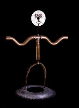 Modern sculpture made with recycled materials.  Similar to human emotions and gestures.