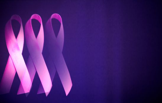 Breast cancer symbol. Three pink ribbons