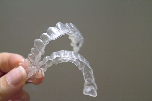 Transparent dental orthodontics to correct dental alignment. No people