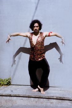 Bollywood dancer man over urban background