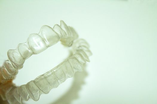 Transparent dental orthodontics to correct dental alignment. No people