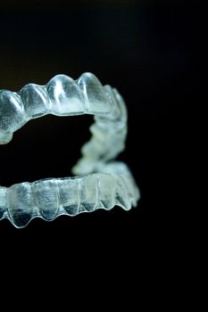 Transparent dental orthodontics to correct dental alignment. No people