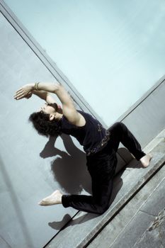 Bollywood dancer man over urban background