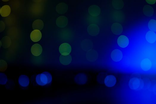 Blue and golden background with bokeh effect. Copy space
