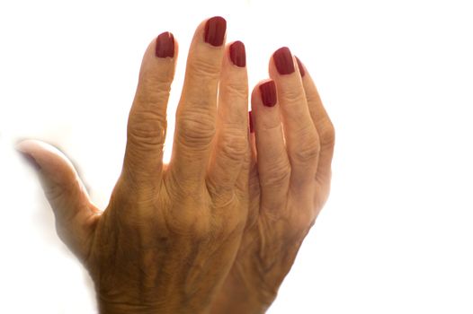 Hands of old woman and elderly caregiver