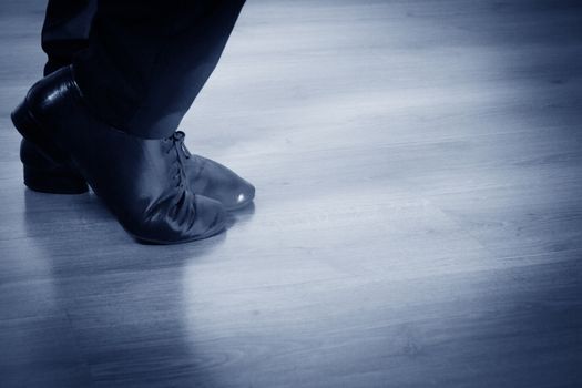 Feet dancer dancing salsa. Copy space