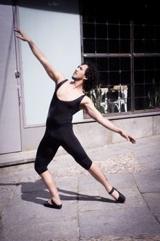 Ballet dancer man with black mallot and ballet tips