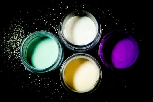Acrylic nail decoration powder. No people