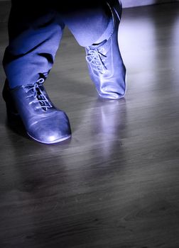 Feet dancer dancing salsa. Copy space