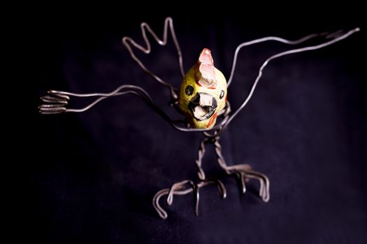 Modern sculpture made with recycled materials.  Similar to human emotions and gestures.