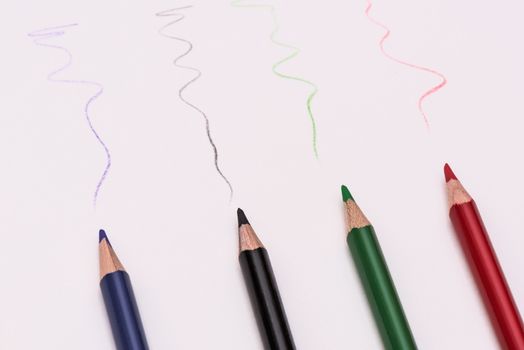 four Colour pencils, colored pencils lay in a heap, school design, items for school design, colored flat education tools, copyspace