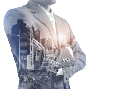 Double exposure of a Businessman wearing suit and a modern city  building of Asia Business financial district and commercial in bangkok thailand