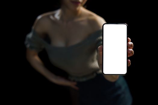 Sexy woman showing white blank display of her mobile phone.