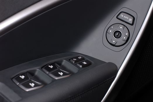 side mirror switch control, car interior detail