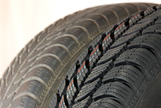 Fragment a new and old modern winter car tires