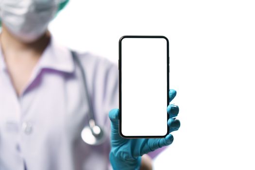 Doctor in uniform holding smart phone with blank white screen for text. Coronavirus, covid-19 outbreak concept. isolated on white background.