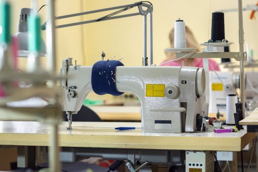 industrial sewing machine in the workshop of the atelier