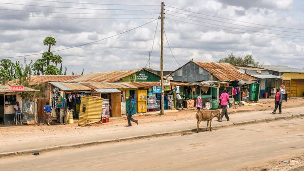 NAMANGA, KENYA - OCTOBER 20, 2014 : Shopping street in Namanga. Namanga is a town lying on the border between Kenya and Tanzania in Kajiado District, Rift Valley Province.