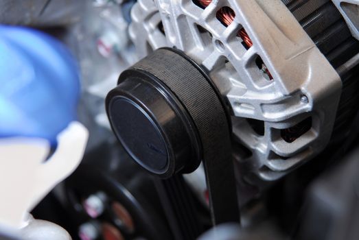 belt and pulley on the car alternator