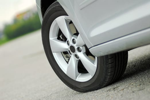 tire and alloy wheel on this passenger car