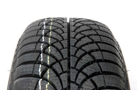 Fragment A brand new modern winter car tire