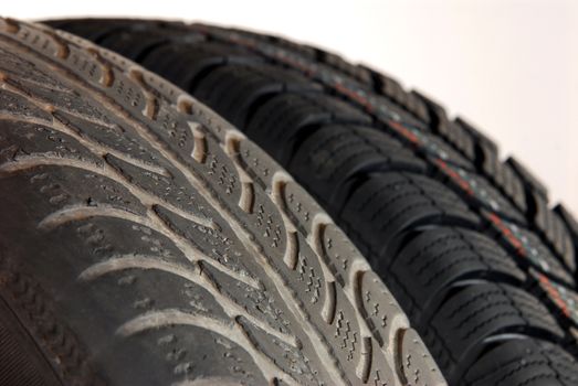 Fragment a old and new modern winter car tires