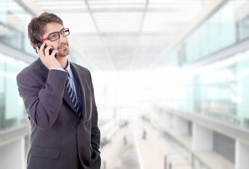 happy business man on the phone, at the office