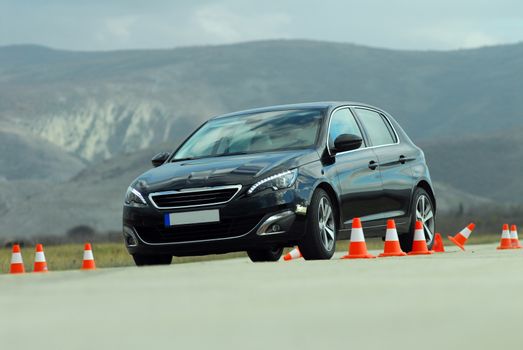 test drive a car at the test site with cones