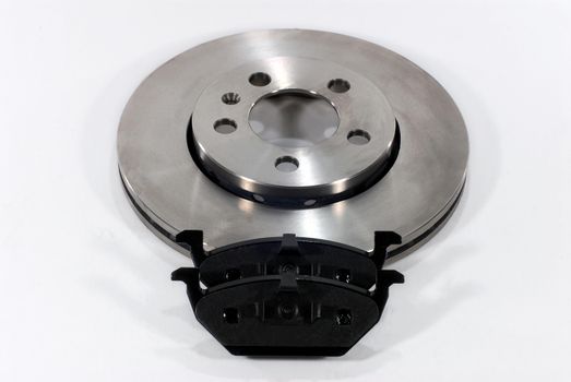 two brake pads and one new brake disc for the car