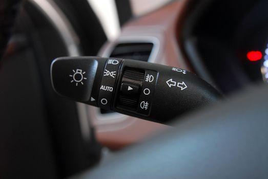 Closeup image of car lighting control switch
