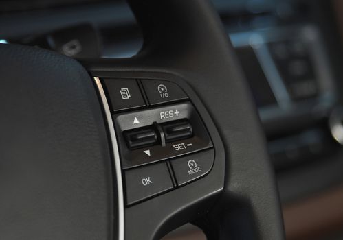 cruise control button which is located on the wheel