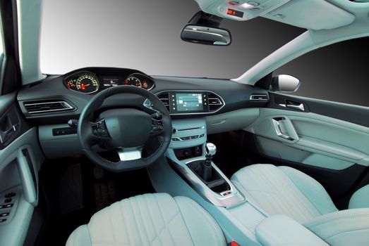 studio shot passenger car interior, front view