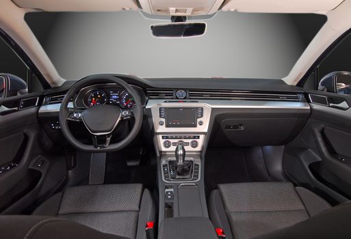 studio shot passenger car interior, front view