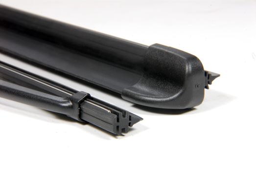two cars windshield wipers on a white background