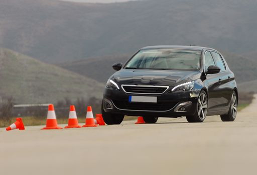 test drive a car at the test site with cones