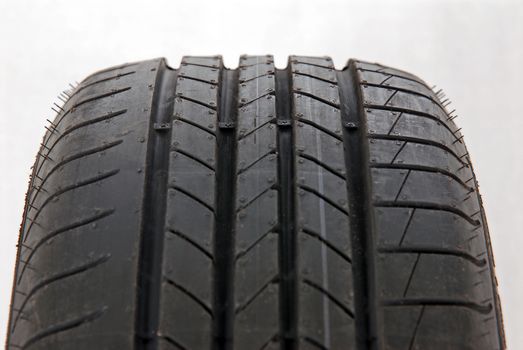 Fragment A brand new modern summer tire